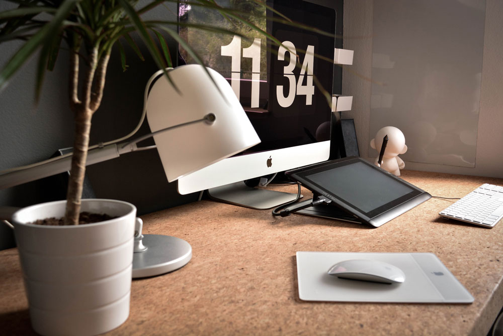 Office space with a Mac computer in 2022